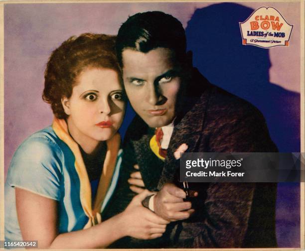 Lobbycard of the movie"Ladies Of The Mob" with from left, Clara Bow and Richard Arlen, in 1928.