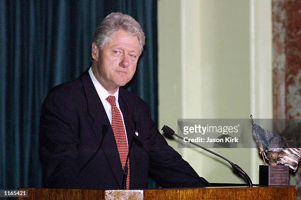 Former U.S. President Bill Clinton speaks at the 2001 Voter Improvement Programs Awards dinner sponsored by the AFL-CIO October 1, 2001 in Beverly...