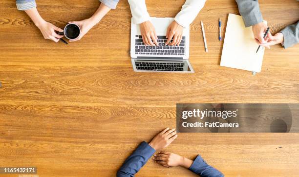 conducting the interview - board room table stock pictures, royalty-free photos & images