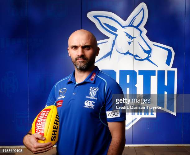 Newly announced North Melbourne Senior Coach Rhyce Shaw poses for a photo during a North Melbourne Kangaroos Media Opportunity at Arden Street Ground...