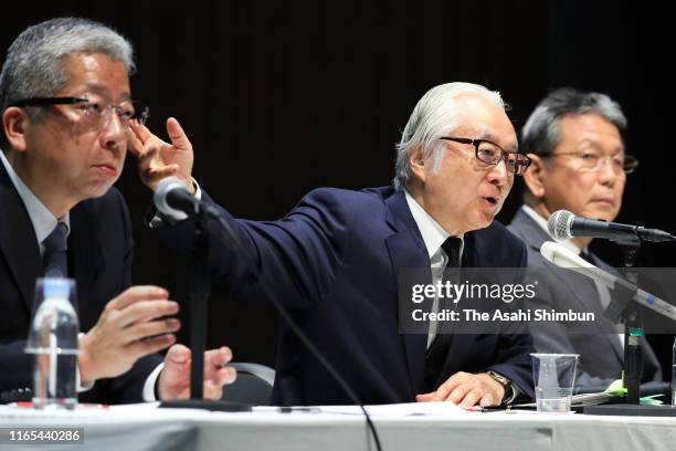 Japan Post Co President Kunio Yokoyama, Japan Post Holdings Co President Masatsugu Nagato and Japan Post Insurance Co President Mitsuhiko Uehira...
