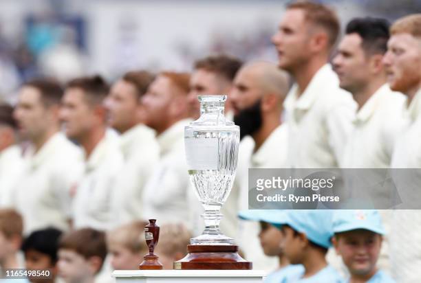 The Ashes Urn and trophy are seen during the anthems during Day One of the 1st Specsavers Ashes Test between England and Australia at Edgbaston on...
