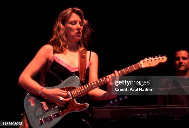 American Blues musician Susan Tedeschi plays guitar as she performs onstage at the Rosemont Theater, Rosemont, Illinois, September 3, 2000.