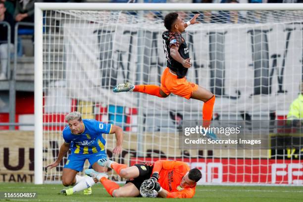 Paul Quasten of RKC Waalwijk, Donyell Malen of PSV, Etienne Vaessen of RKC Waalwijk during the Dutch Eredivisie match between RKC Waalwijk v PSV at...