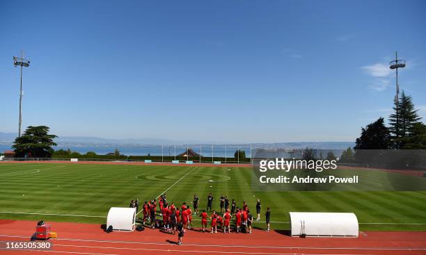 Jurgen Klopp manager of Liverpool talking with his team before a training session on August 01, 2019 in Evian-les-Bains, France.