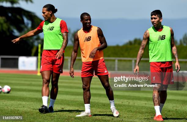 Virgil van Dijk and Georginio Wijnaldum of Liverpool during a training session on August 01, 2019 in Evian-les-Bains, France.