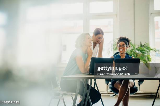 business women having a meeting in a modern office. - focus group discussion stock pictures, royalty-free photos & images