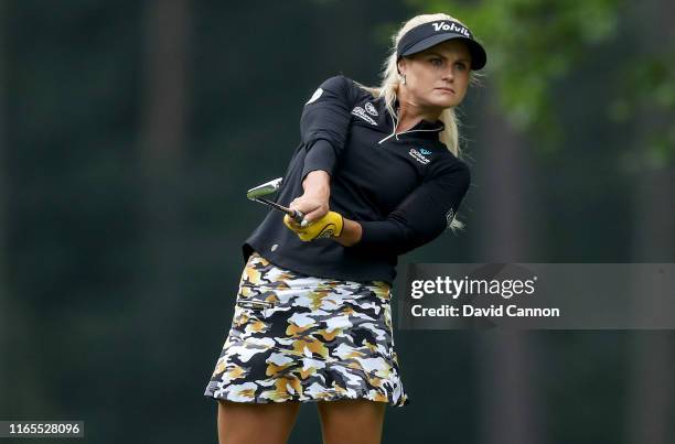 Carly Booth of Scotland plays her second shot on the third hole during Day One of the AIG Women's British Open on the Marquess Course at Woburn Golf...