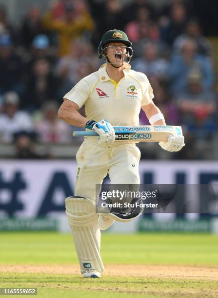 Australia batsman Steven Smith celebrates as he reaches his century off the bowling of Ben Stokes during day one of the First Specsavers Ashes Test...