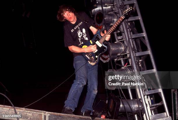 American Alternative Rock musician Thurston Moore, of the group Sonic Youth, plays guitar as he performs onstage at the Rosemont Horizon, Rosemont,...