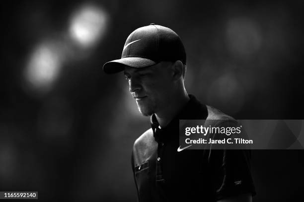 Cameron Champ walks off the 14th green during the first round of the Wyndham Championship at Sedgefield Country Club on August 01, 2019 in...