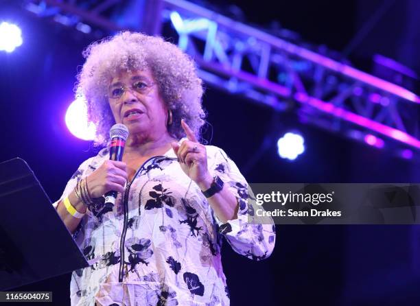 American political activist, academic and author Angela Davis reads a statement during NPR Music's Turning the Tables Live: The Motherlode as part of...