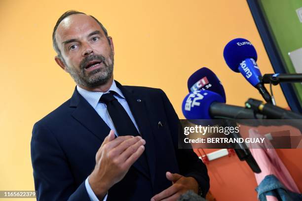 French Prime Minister Edouard Philippe speaks to medias on the first day of the school year on September 2, 2019 at Toussaint Louverture school in...