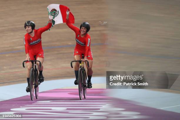 Luz Daniela Gaxiola Gonzalez and Jessica Salazar Valles of Mexico celebrates after winning the Woman Team Sprint Finals at the Velodrome of Villa...