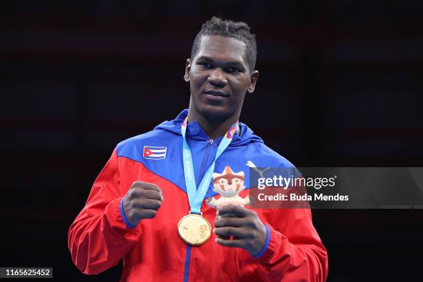 Gold medalist Dainier Peró Jústiz of Cuba in the podium of in men´s Boxing Heavy on Day 6 of Lima 2019 Pan American Games at Coliseo Miguel Grau at...