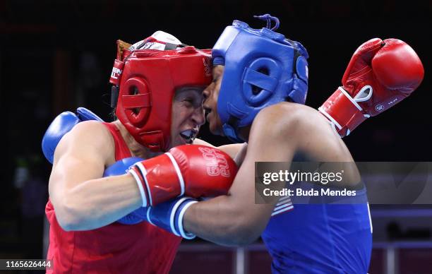 Myriam Da Silva of Canada and Oshae Jones of United States eschange punches during Women's Boxing Welter Final Bout on Day 6 of Lima 2019 Pan...