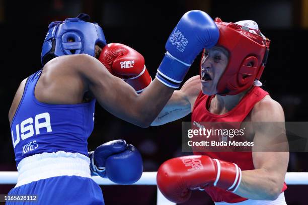 Myriam Da Silva of Canada and Oshae Jones of United States exchange punches during Women's Boxing Welter Final Bout on Day 6 of Lima 2019 Pan...