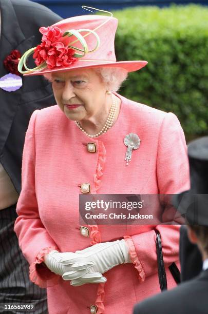 Queen Elizabeth II prepares to present the Gold Cup in the Parade Ring on Ladies Day at Royal Ascot at Ascot Racecourse on June 14, 2011 in Ascot,...