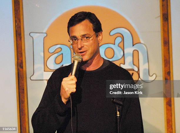 Comedian Bob Saget preforms at "Boys Night Out" a comedy benefit at The Laugh Factory hosted by talk radio host Tom Leykis October 11, 2001 in...