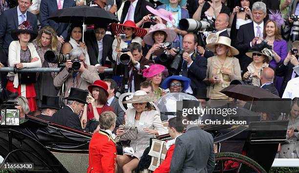 Carole Middleton and Michael Middleton arrive as part of the royal carriage procession on Ladies Day at Royal Ascot at Ascot Racecourse on June 14,...