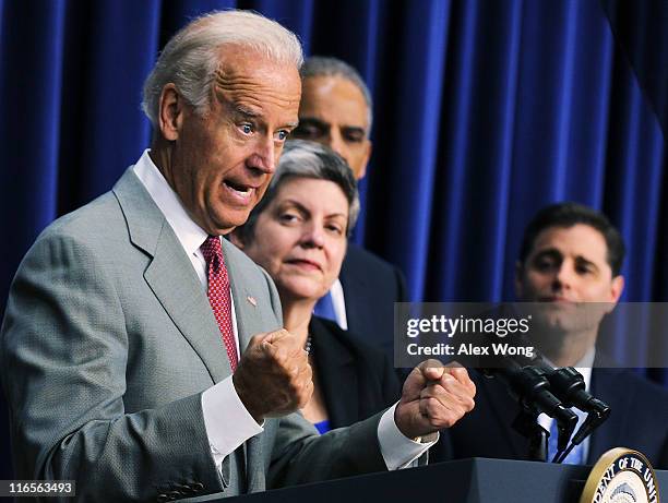 Vice President Joseph Biden speaks as Secretary of Homeland Security Janet Napolitano, Attorney General Eric Holder, and Federal Communications...