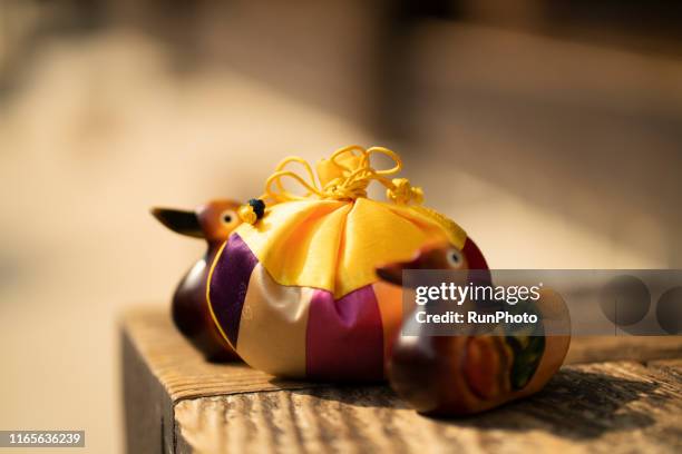 korean traditional image, lucky bag and wooden goose - chuseok stock pictures, royalty-free photos & images