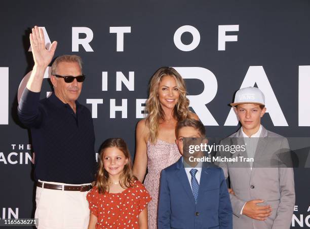 Kevin Costner, Christine Baumgartner and their children attend the Los Angeles premiere of 20th Century Fox's "The Art of Racing In The Rain" held at...