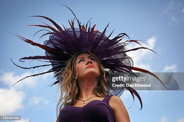 Racegoer stands by the racecourse on Ladies Day at Royal Ascot on June 16, 2011 in Ascot, England. The five-day meeting is one of the highlights of...