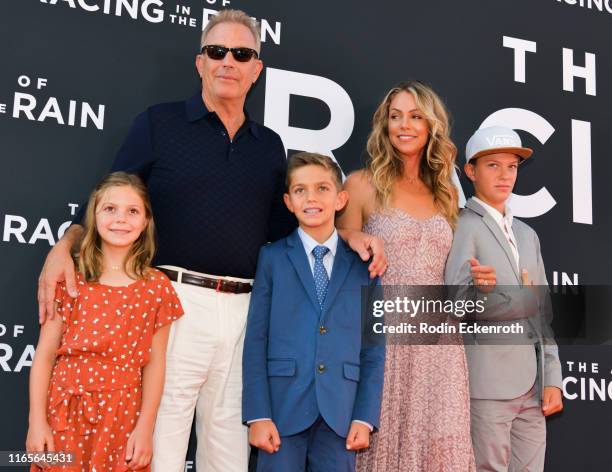 Grace Avery Costner, Kevin Costner, Hayes Logan Costner, Christine Baumgartner, and Cayden Wyatt Costner attend the premiere of 20th Century Fox's...