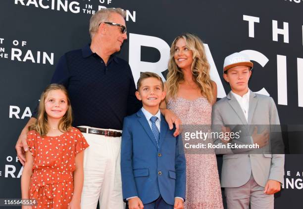 Grace Avery Costner, Kevin Costner, Hayes Logan Costner, Christine Baumgartner, and Cayden Wyatt Costner attend the premiere of 20th Century Fox's...