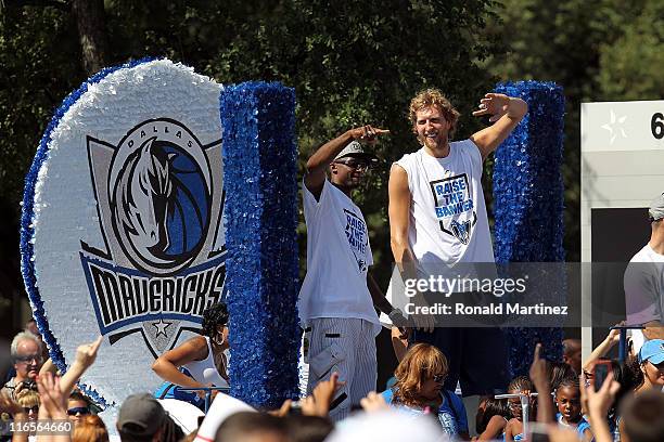 Jason Terry, Dirk Nowitzki and Jason Kidd celebrate during the Dallas Mavericks Victory Parade on June 16, 2011 in Dallas, Texas.