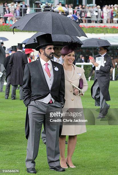 Sheikh Maktoum bin Rashid Al Maktoum and Princess Haya Bint Al Hussein look at horses in the parade ring on Ladies Day at Royal Ascot at Ascot...