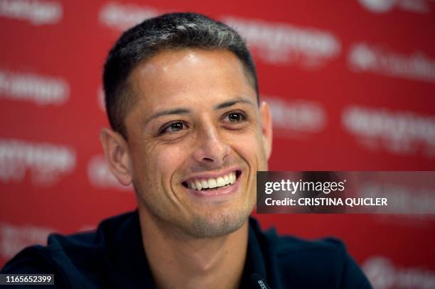 Sevilla's new player Mexican Javier Hernandez 'Chicharito' gives as press conference during his official presentation at the Sport City of Sevilla,...