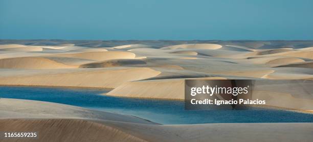 sand dunes, lençóis maranhenses national park - lencois maranhenses national park stock-fotos und bilder