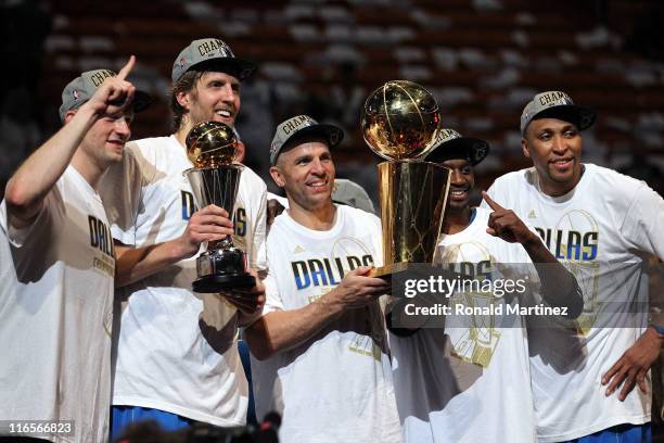 Brian Cardinal, Finals MVP Dirk Nowitzki, Jason Kidd, Jason Terry and Shawn Marion of the Dallas Mavericks celebrate with the Larry O'Brien...