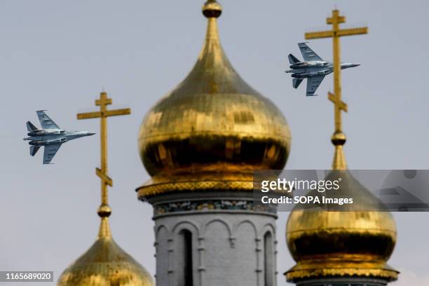 Two Sukhoi Su-35 S jet fighters of the "Falcons of Russia" team perform its flight display on the final day of MAKS-2019 Moscow International Airshow...