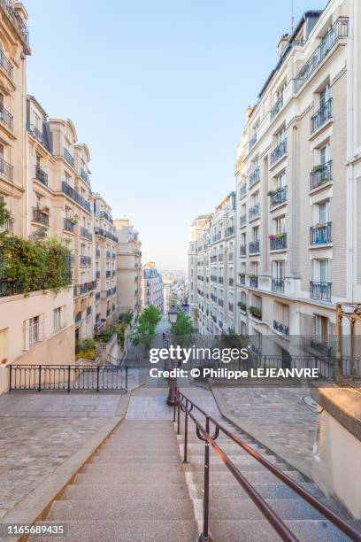 parisian buildings against blue sky - local high street stock pictures, royalty-free photos & images