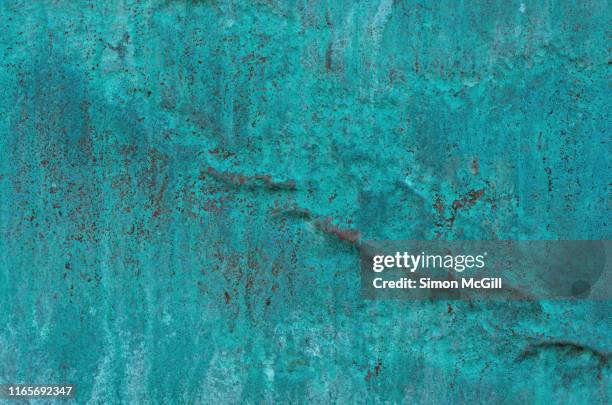 green patina (verdigris) on weathered copper sheet metal - pátina fotografías e imágenes de stock