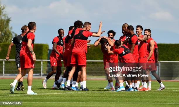 Dejan Lovren, Mohamed Salah and the rest of the players for Liverpool during a training session on August 02, 2019 in Evian-les-Bains, France.