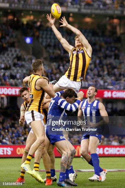 Tim O’Brien of the Hawks attempts to mark the ball during the round 20 AFL match between the North Melbourne Kangaroos and the Hawthorn Hawks at...