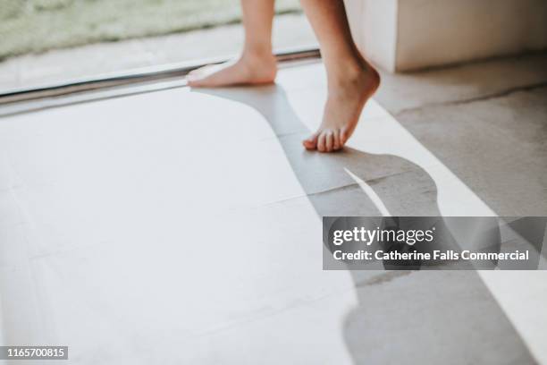 little feet - girl with legs open stock pictures, royalty-free photos & images