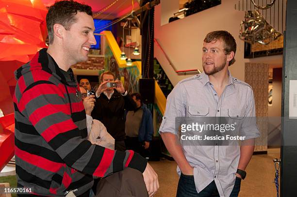 Mike O'Hara visits with Drew Storen, relief pitcher for the Washington Nationals, at the MLB Fan Cave located on Broadway and 4th Street on May 18,...