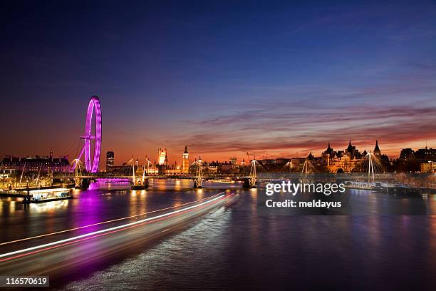 westminster (london) at sunset - big ben london eye dusk stockfoto's en -beelden