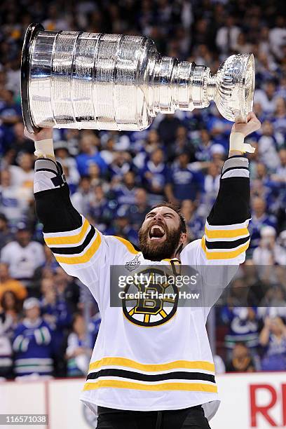 Zdeno Chara of the Boston Bruins celebrates with the Stanley Cup after defeating the Vancouver Canucks in Game Seven of the 2011 NHL Stanley Cup...