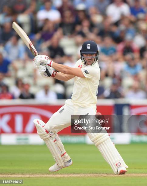 England batsman Rory Burns cuts a ball to the boundary during day two of the First Specsavers Test Match between England and Australia at Edgbaston...