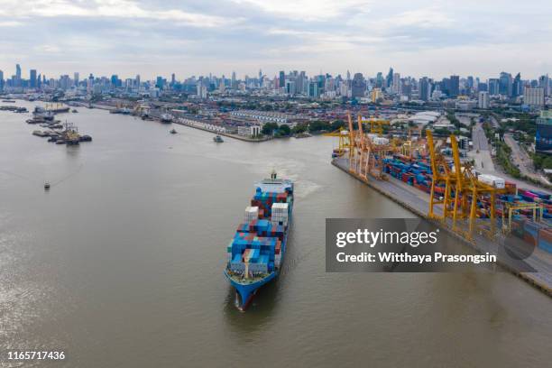 container ship business freight import export logistic and transportation by container ship, aerial front view. - rotterdam market stock pictures, royalty-free photos & images