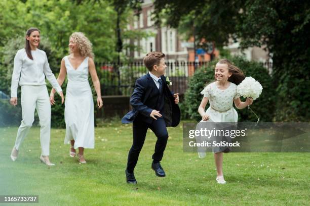 the happiest family! - pageboy stock pictures, royalty-free photos & images