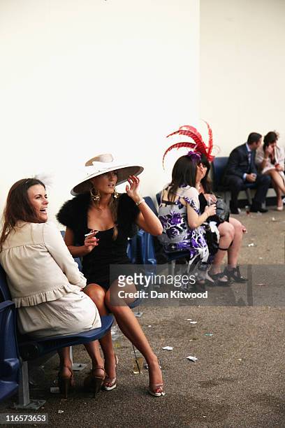 Racegoers relax after racing on ladies day at Royal Ascot on June 15, 2011 in Ascot, England. The five-day meeting is one of the highlights of the...