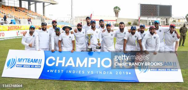 India team with trophy after winning on day 4 of the 2nd and final Test between West Indies and India at Sabina Park, Kingston, Jamaica, on September...