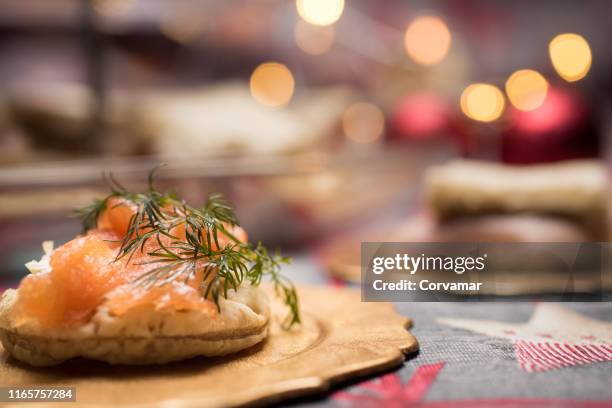 aperitivos navideños - smoked salmon stock pictures, royalty-free photos & images